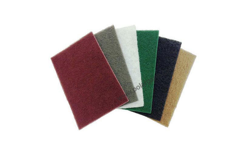 Non-metallic abrasive pad